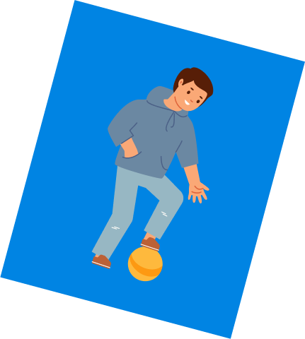 A boy playing soccer, controlling the ball.